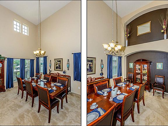 This rather large Formal Dining Room boasts a tall ceiling and designer nook- Would also be a great Formal Living Room if desired.