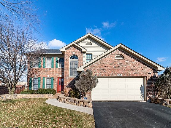 Brick and cedar exterior, oversized lot!