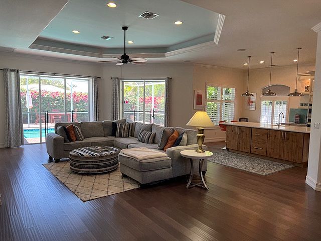 Open lIving room/dining room concept. High ceilings