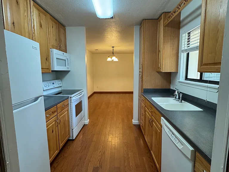 View of kitchen through to dining room