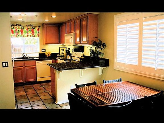 Kitchen with Black Granite Counters