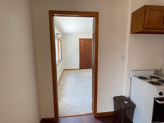 Looking at the first bedroom from the kitchen