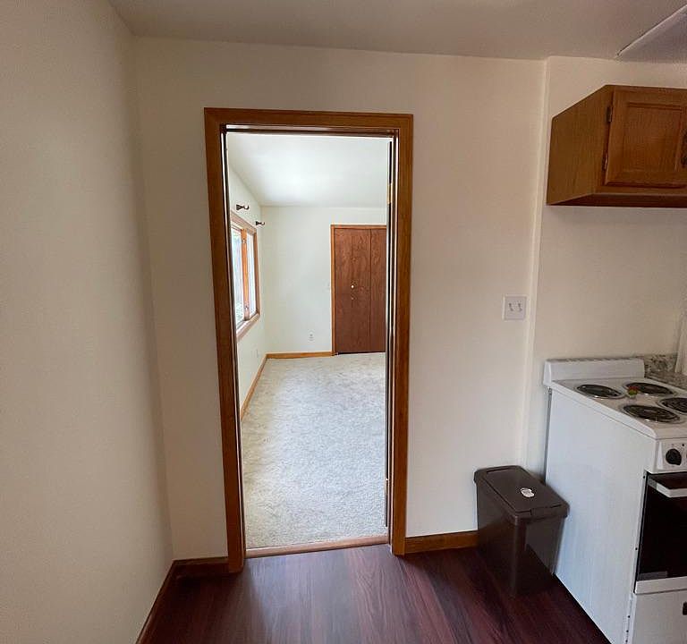 Looking at the first bedroom from the kitchen