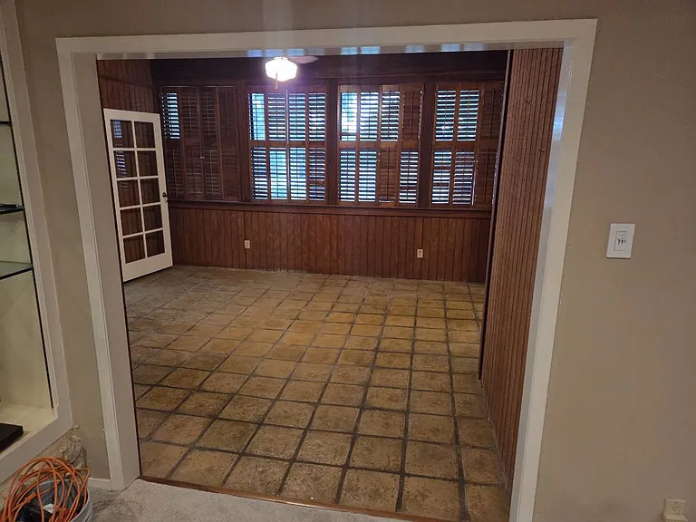 Additional living / den. Storage with included upright freezer