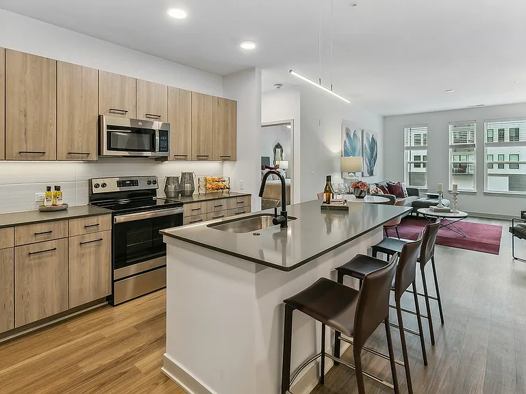 Experience easy living with a kitchen that flows seamlessly into the dining and living areas.