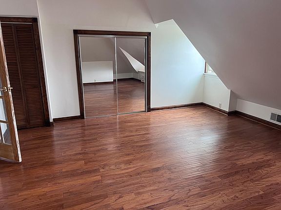 Bedroom showing closet doors