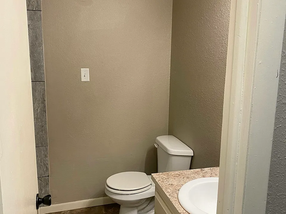 There is a small linen closet in the bathroom