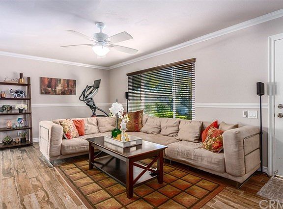 LIVING ROOM WITH A GREAT VIEW OF THE COMPLEX!