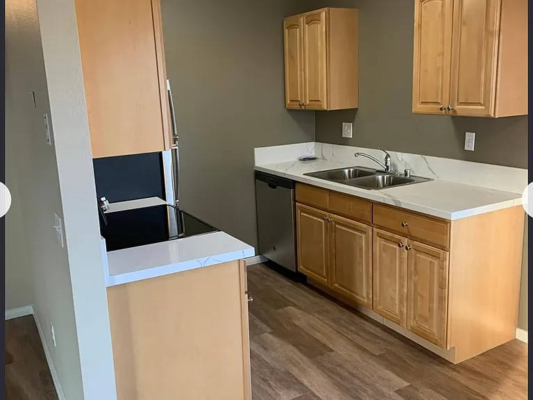 Full kitchen with a dishwasher