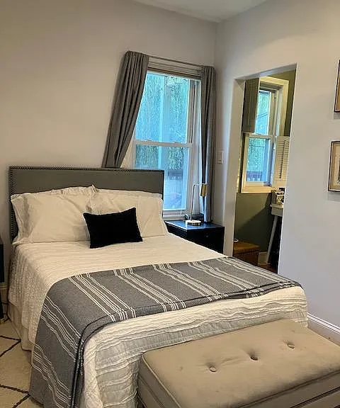 Back bedroom with windows overlooking your porch and the back yard.