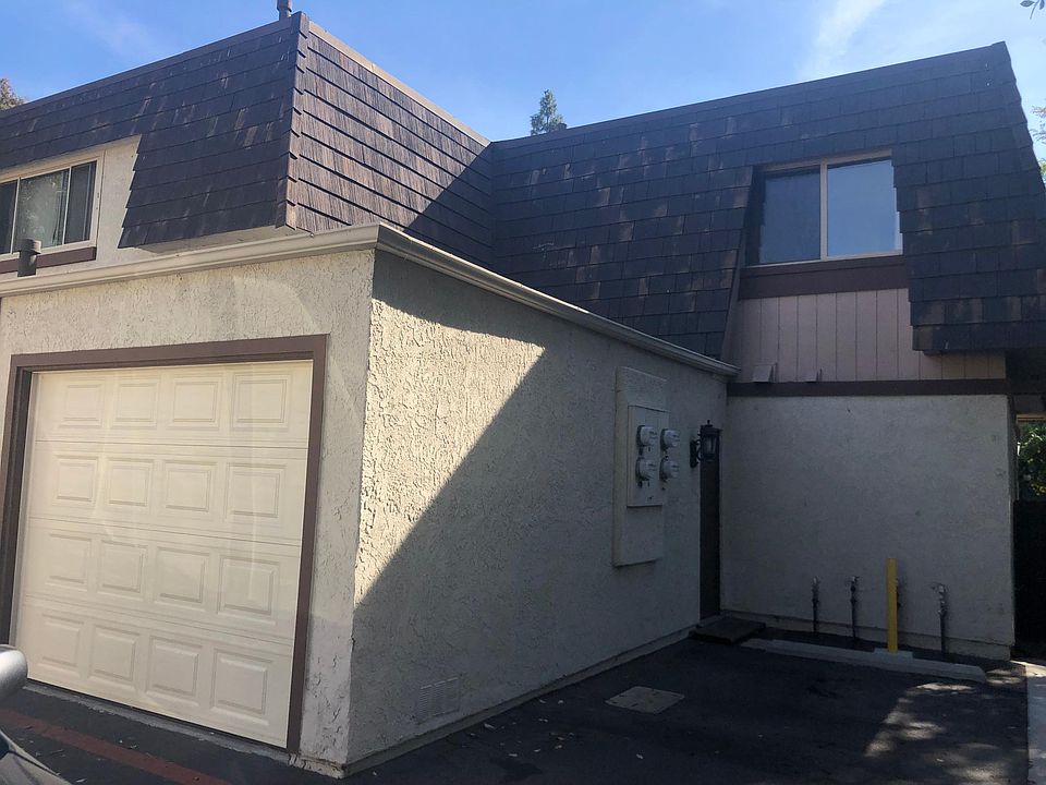 Garage and adjacent carport.