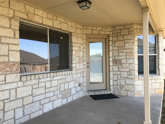 Covered, all rock patio.