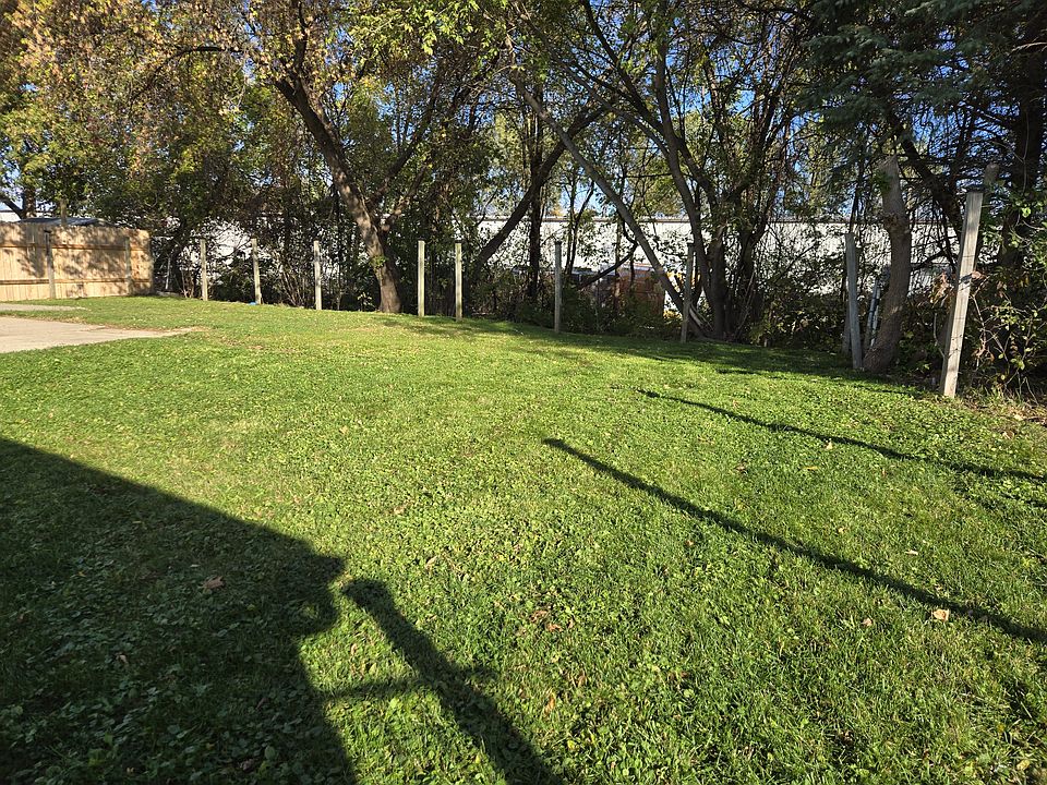 Back yard looking northwest, overlooking the wooded area / gully