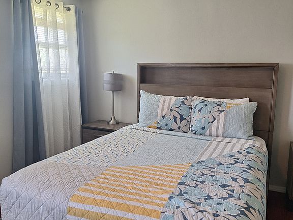 Master bedroom with queen bed