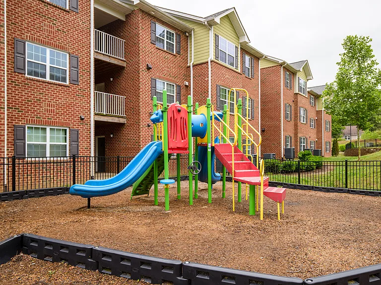 Safe and fenced-in playground area conveniently located within the communityfamily-friendly and fun-filled.