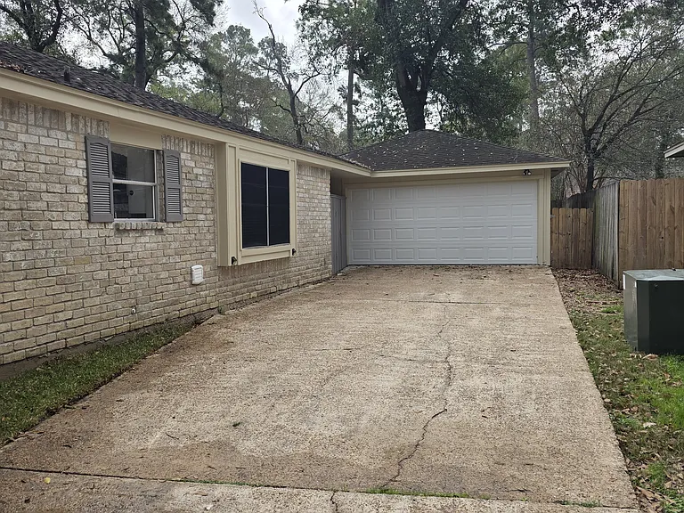Two-car garage with access to the backyard.