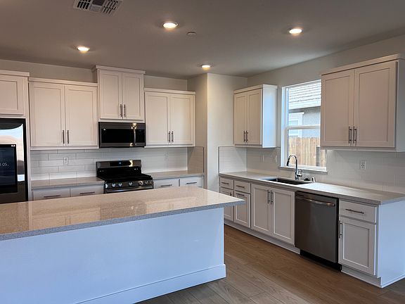 Kitchen sink and island