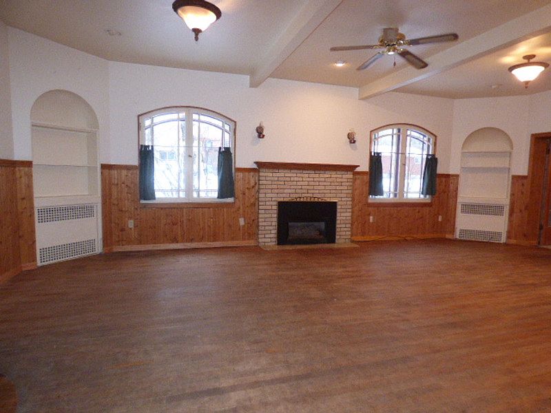 Inside, from the front entry you walk into the living room with a gas fireplace.