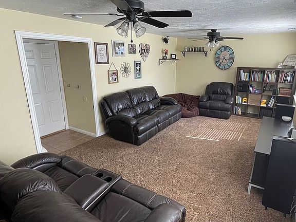 Living room leads to garage