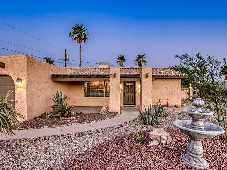 Inviting covered front entry in a quiet, well-maintained neighborhood.