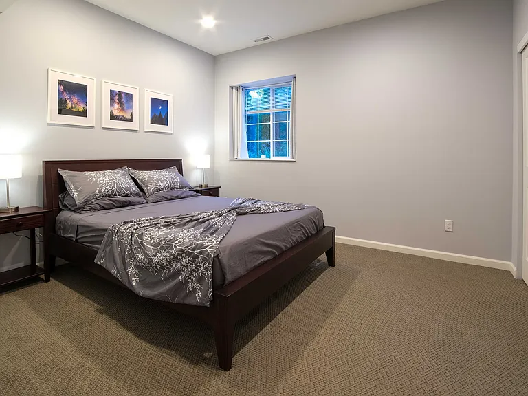 Bedroom with queen bed and plenty of space. Also allows for desk setup in bedroom.