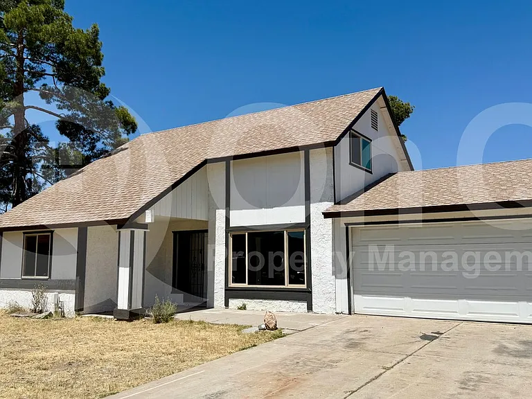 9459 N 64th Dr — Photo 1