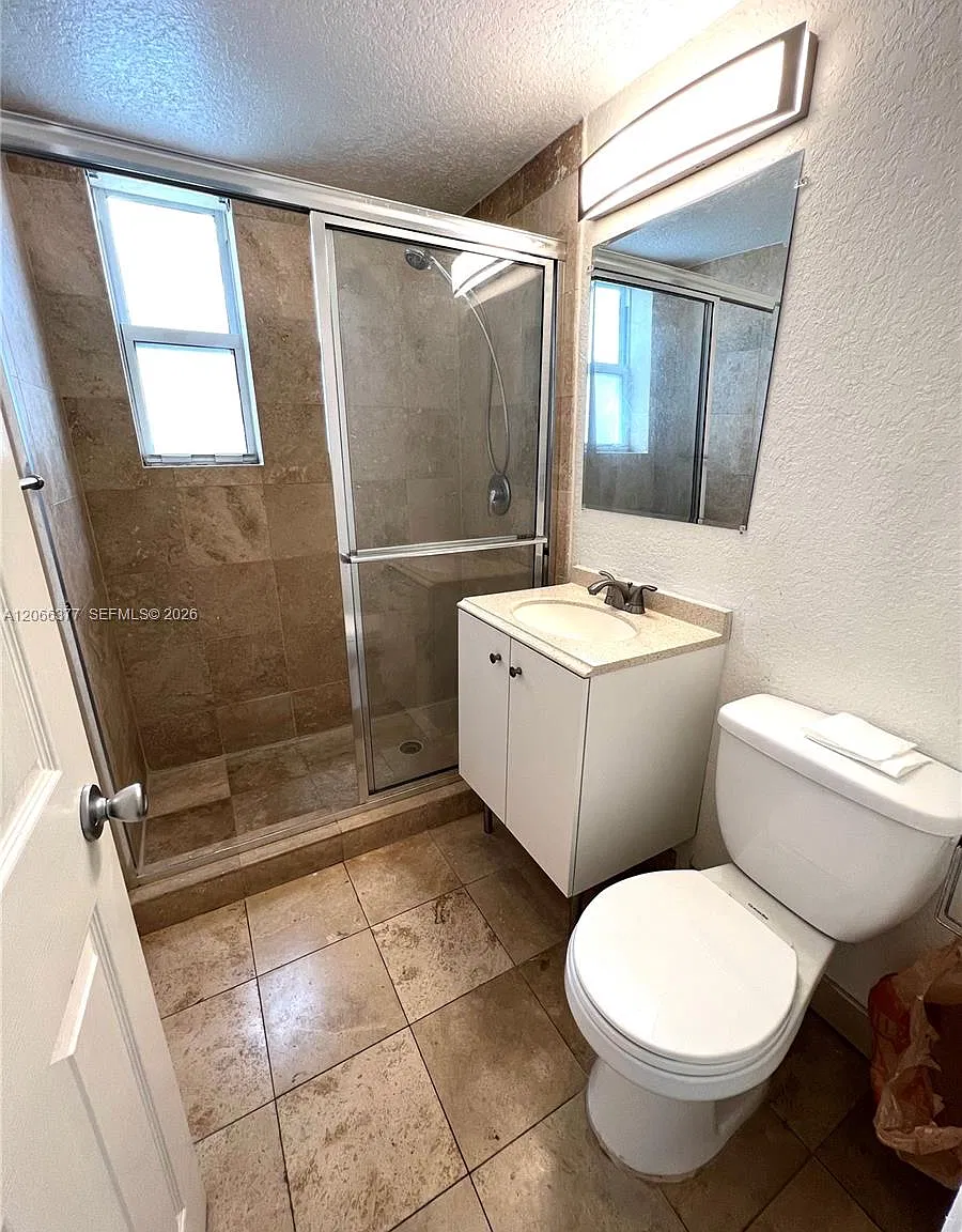 Harding Avenue Condo — Photo 4