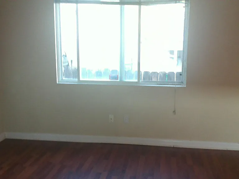 Bedroom two is 8'3 x 10'3"