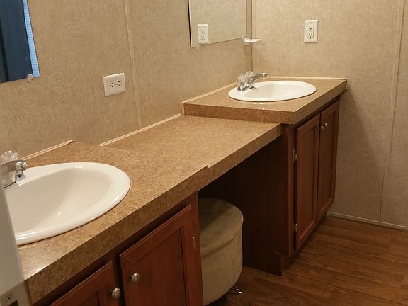 Master bath has garden tub and separate shower