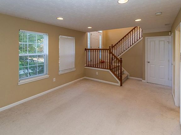 Lower level basement area with finished full bathroom