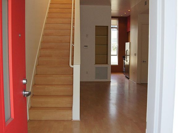 Welcome - Come Inside. This home is three stories. The first floor is two-car tandem garage with laundry facilities. Second floor is family room, kitchen and full bath. Loft hosts master bedroom, walk-in closet and en suite bath.