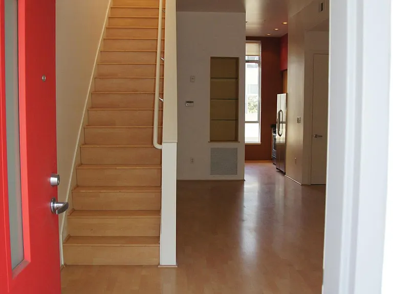Welcome - Come Inside. This home is three stories. The first floor is two-car tandem garage with laundry facilities. Second floor is family room, kitchen and full bath. Loft hosts master bedroom, walk-in closet and en suite bath.