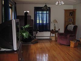 LR with hardwd floors and woodstove