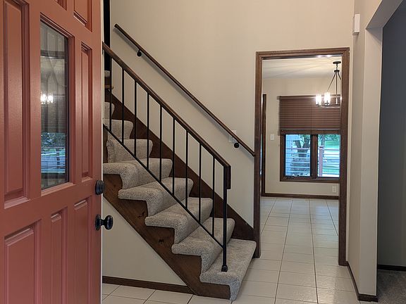 Welcome home! Head to the living room (or office?) to your right, dining area straight ahead, or up the stairs to the 4 bedrooms and 2 baths.