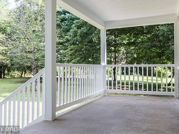 Deep front porch has room for furniture!