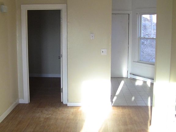 View of bedroom and kitchen from front of the living room