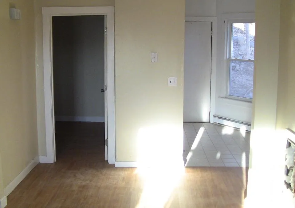 View of bedroom and kitchen from front of the living room