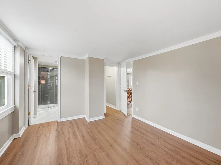 Primary Bedroom with Walk In Closet and En Suite Bathroom