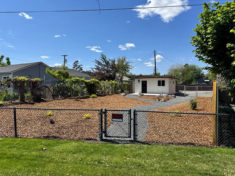Private gate to access the river front park and walking path