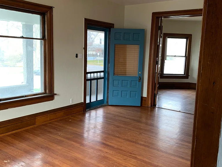 Hardwood floors in the living area and bedroom