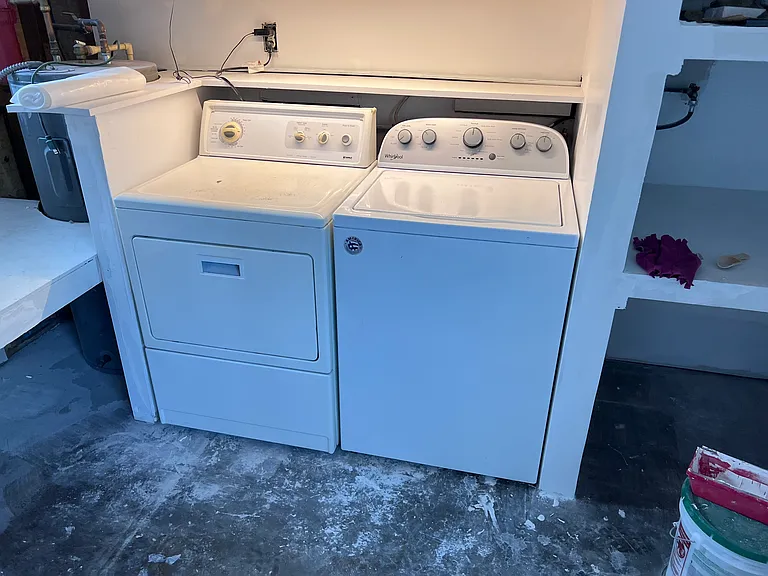 Laundry Room w/ AC, storage, and work bench