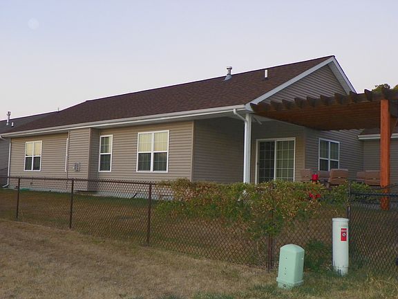 back wit covered patio and p