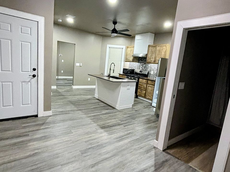 Island kitchen. New floors. Pocket sliding door into bathroom