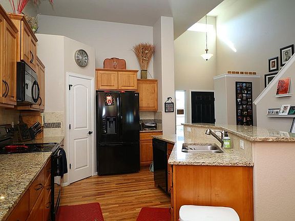 Open Concept Kitchen with Vaulted Ceilings