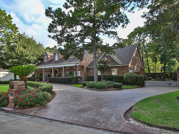 THIS MAGNIFICENT RESIDENCE SITS ON 13,526 SQ FT IN A PRIME LOCATION IN THE NEIGHBORHOOD OF CHAMPION FOREST. This 2-story stunning Custom Home with 4 bedrooms, 3 full and 2 half baths with study, and game room in highly regarded Champion Forest is jus