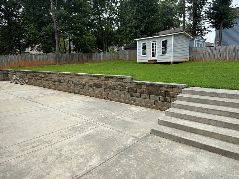 Beautiful spacious backyard w/access to a storage room.