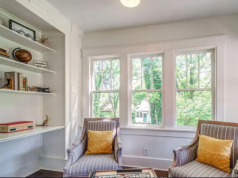 Nook off front living room with a built-in desk