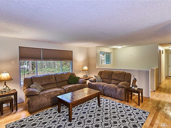 Open living room with hardwoods flooring. 
