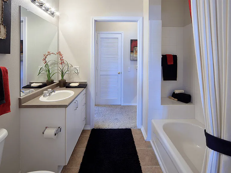 Elevate your daily routine in our spacious apartment bathrooms
