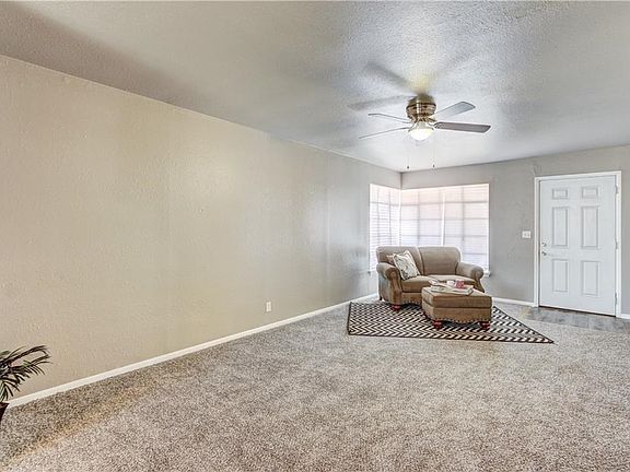 Living room, New carpet and paint through out home.